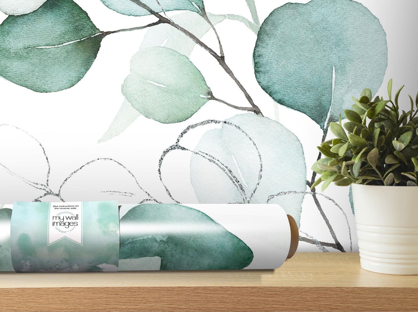 a vase with a plant on top of a table
