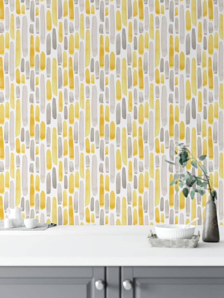 a white table topped with a vase filled with flowers