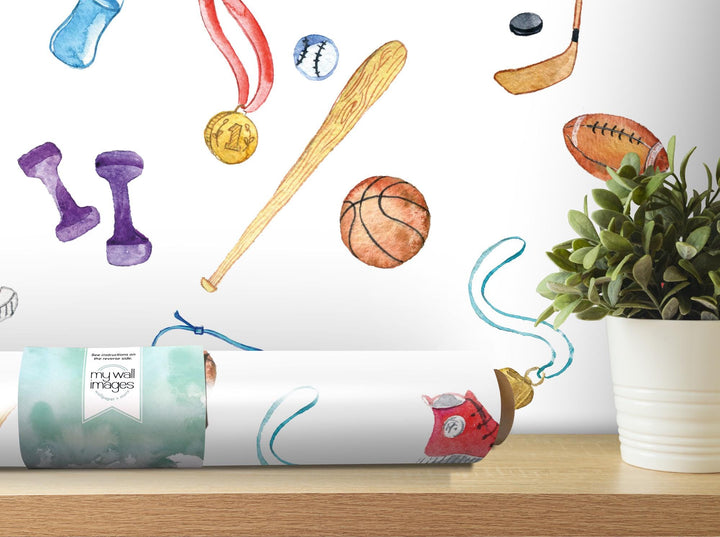 a painting of sports items on a wall next to a potted plant