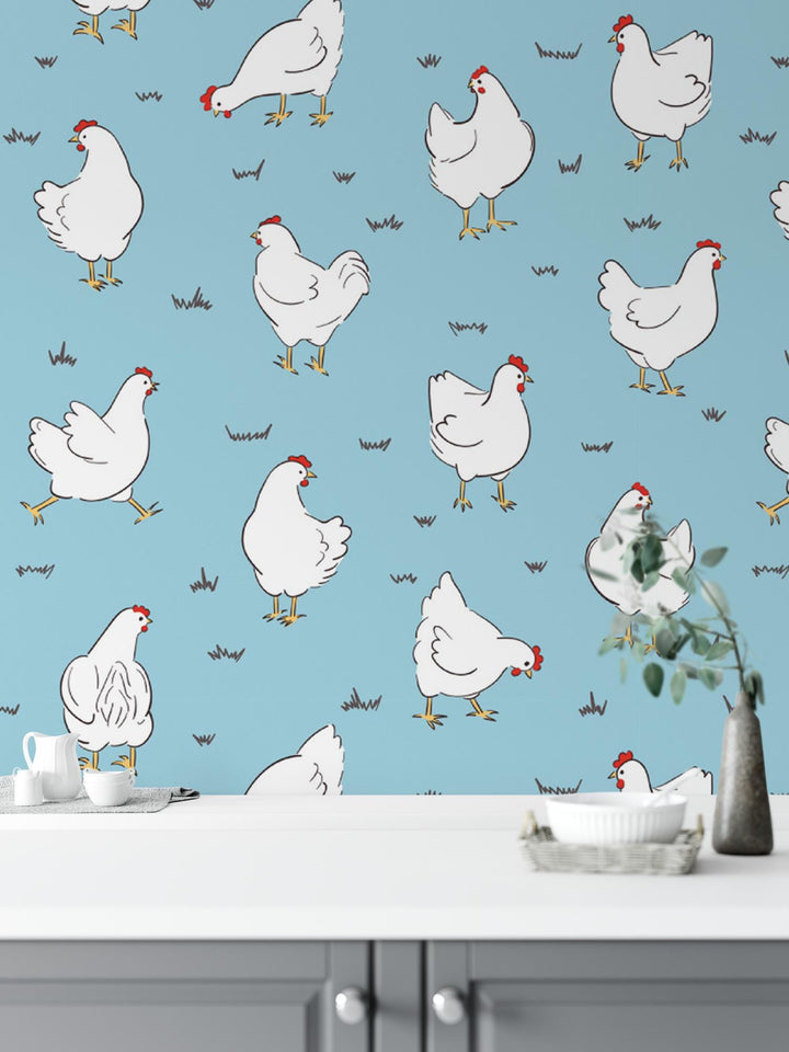 a blue wall with a bunch of chickens on it