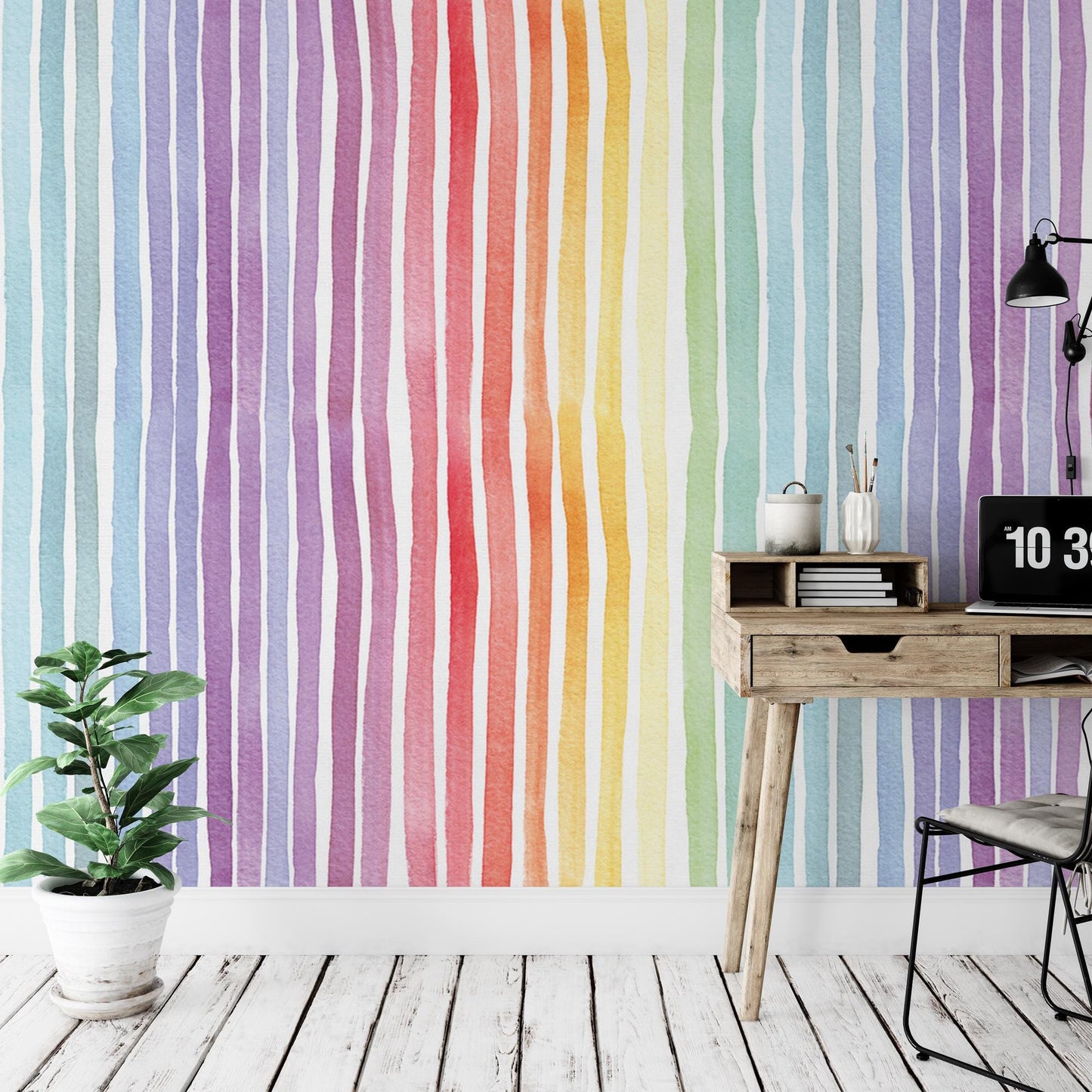 a room with a desk, chair, and a rainbow wallpaper