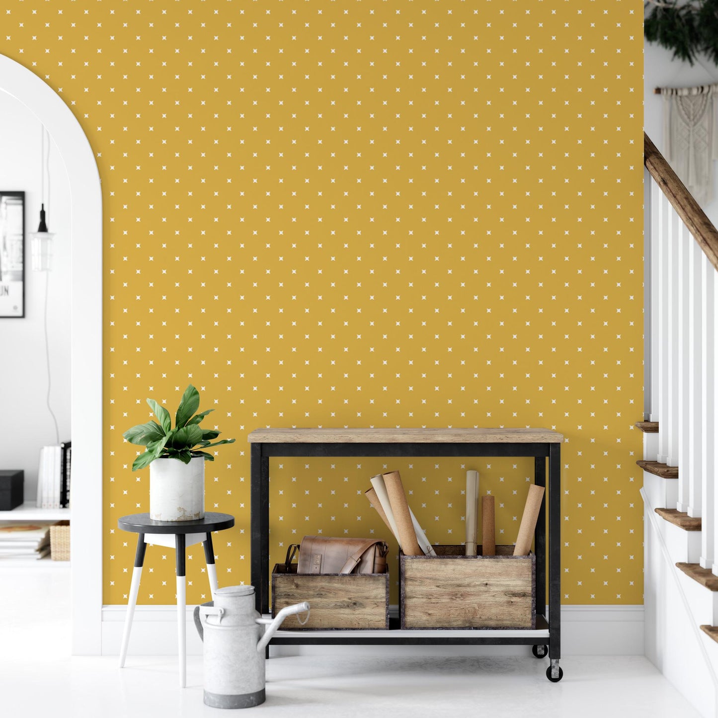a living room with a yellow wall and a white stair case