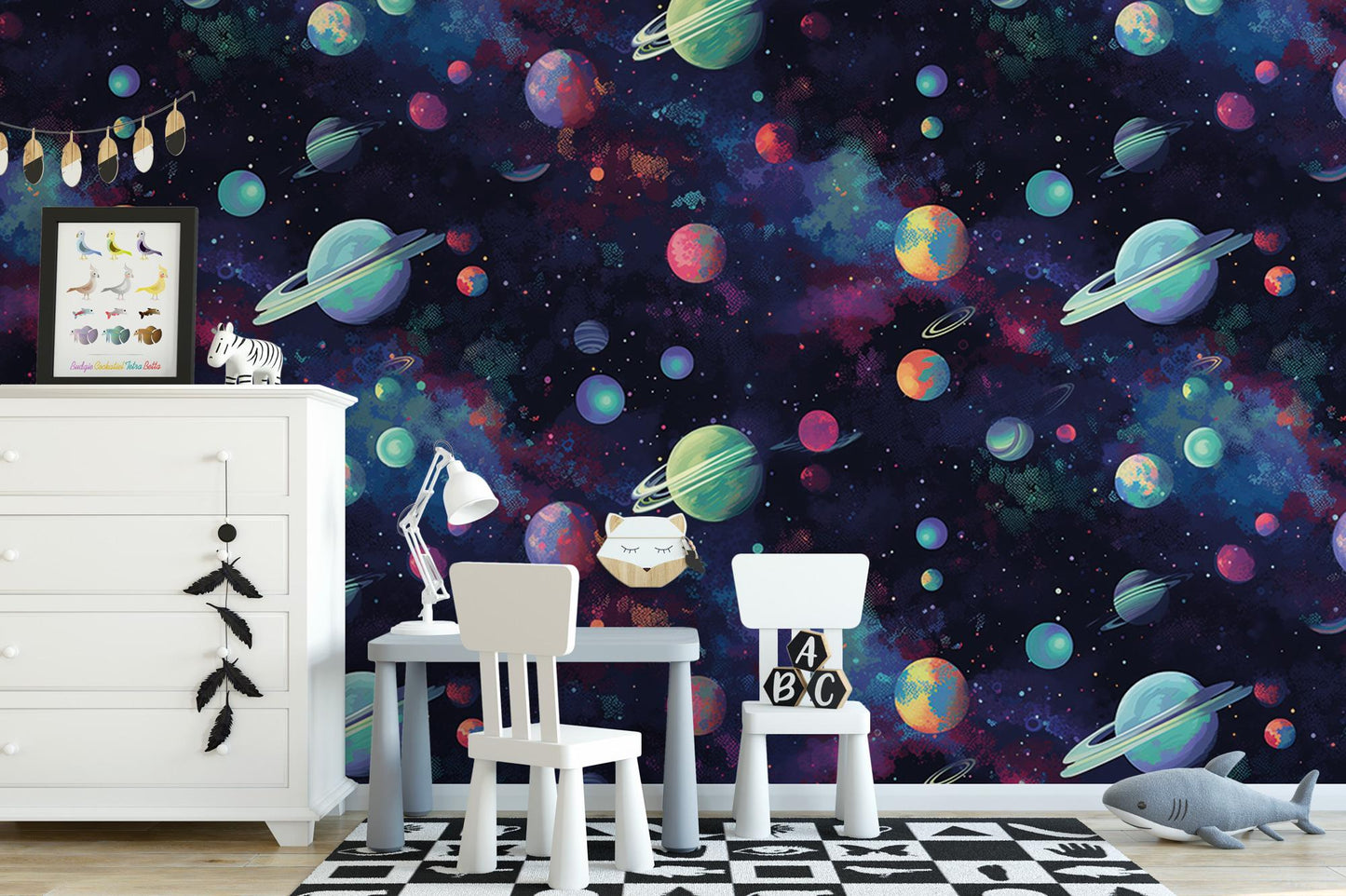 a child's room with a space themed wallpaper