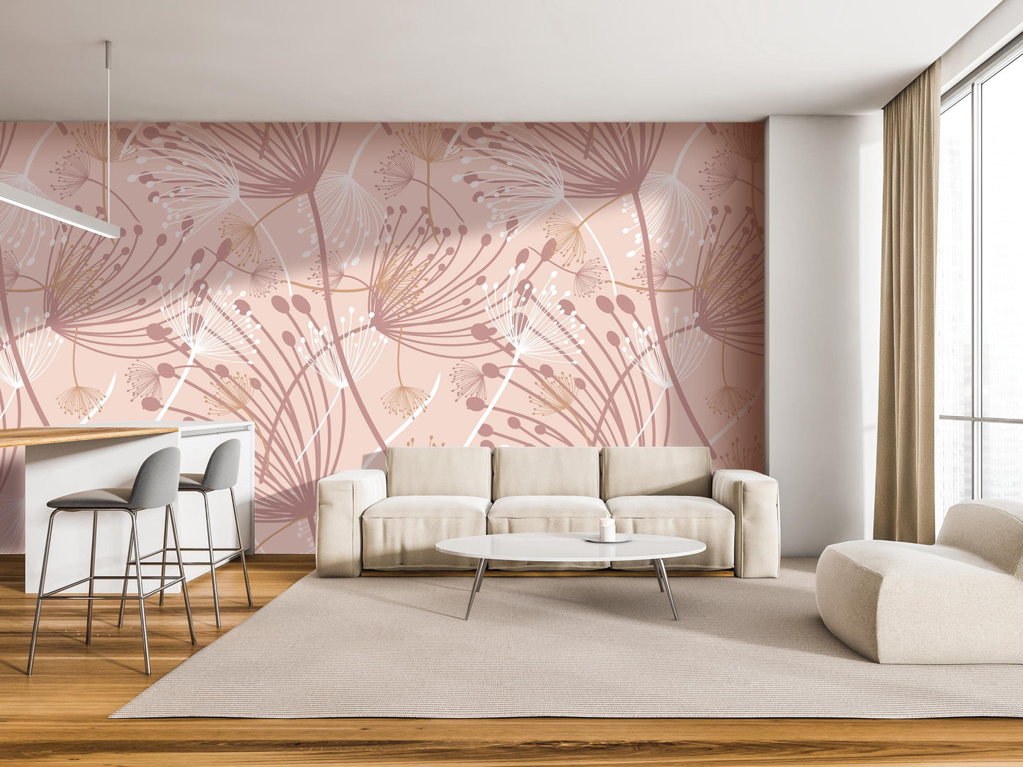 a modern living room with a pink and white floral pattern on the wall behind a white sofa and a round coffee table. The room also includes a bar area with stools and a large window providing natural light.