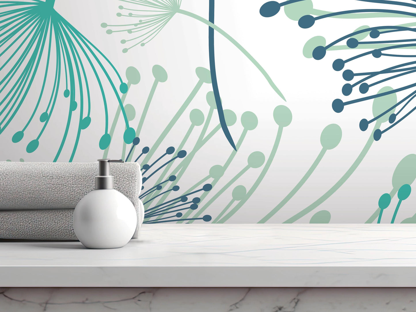 a white countertop with a white soap dispenser and a gray towel, set against a wall with a colorful abstract floral pattern.