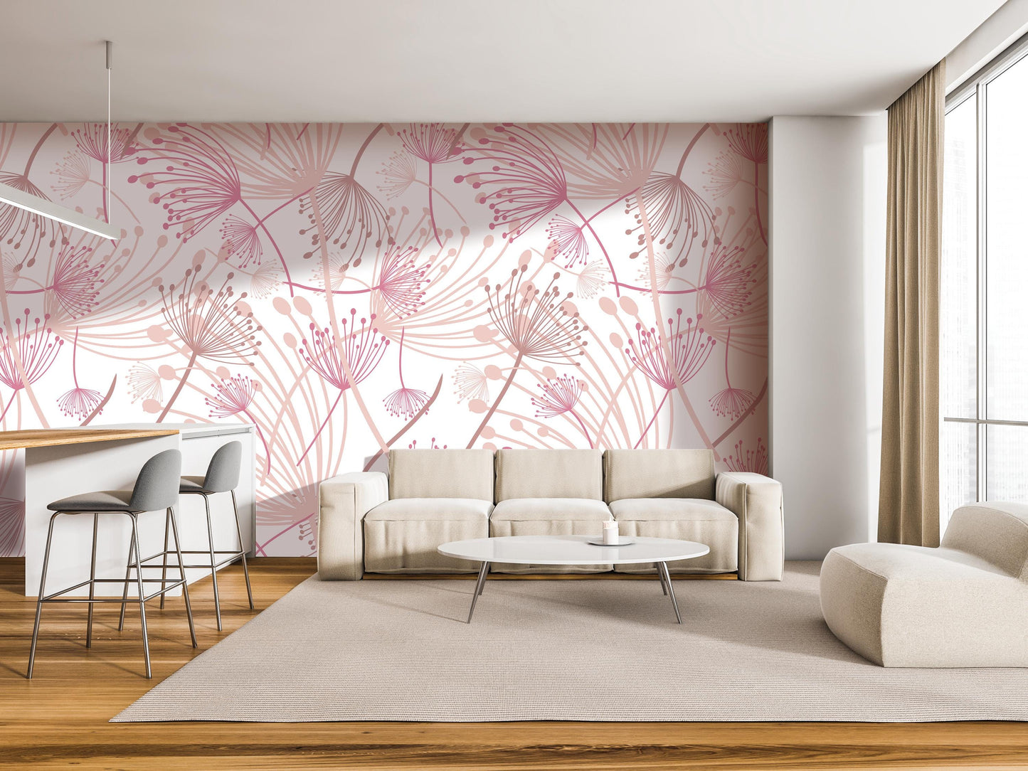 a modern living room with a pink and white floral pattern on the wall behind a white sofa and a round coffee table. The room also includes a dining area with a bar and stools, and a large window with curtains.