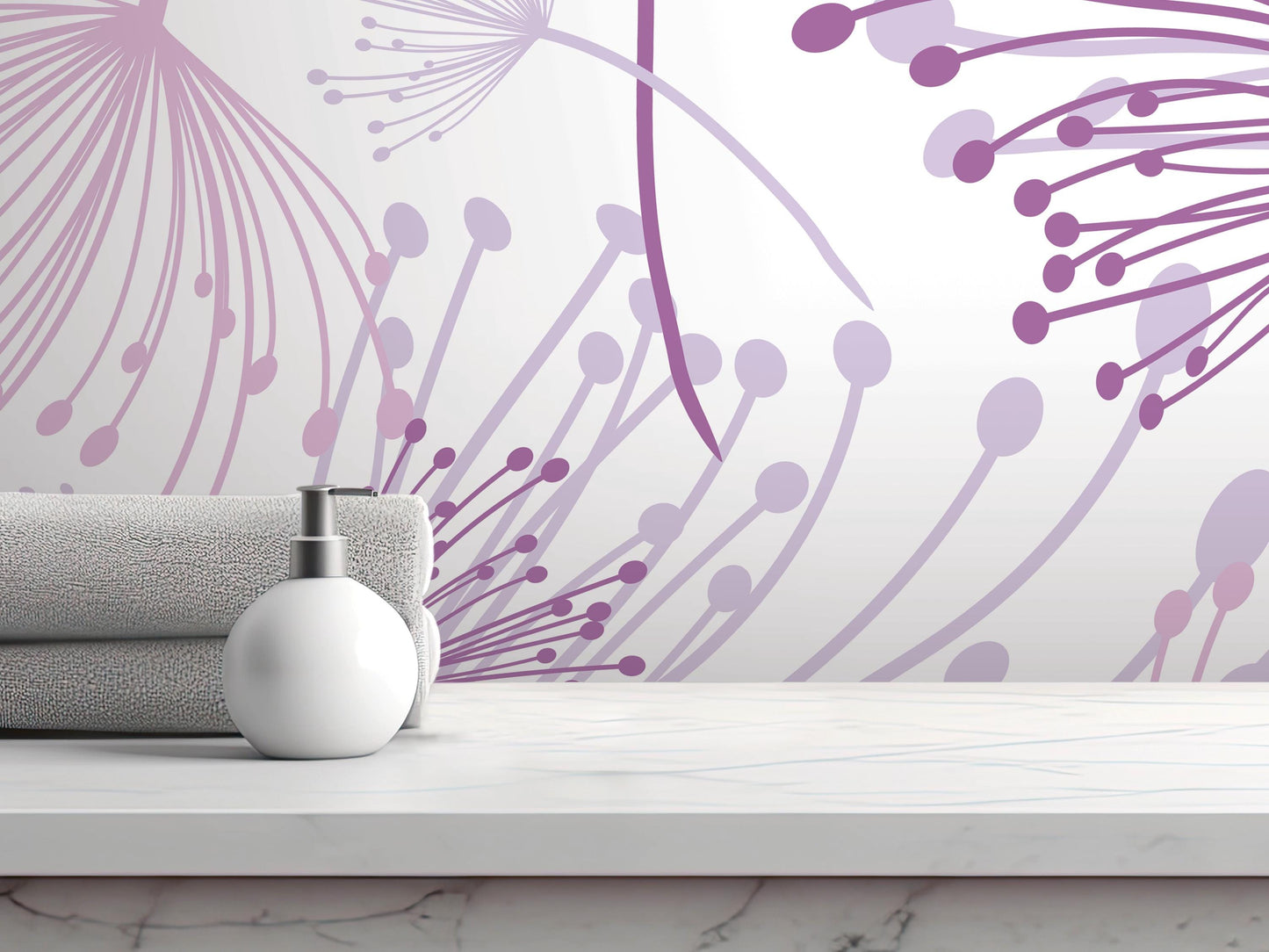 a white countertop with a white soap dispenser and a folded towel, set against a wall with a purple and white abstract floral pattern.