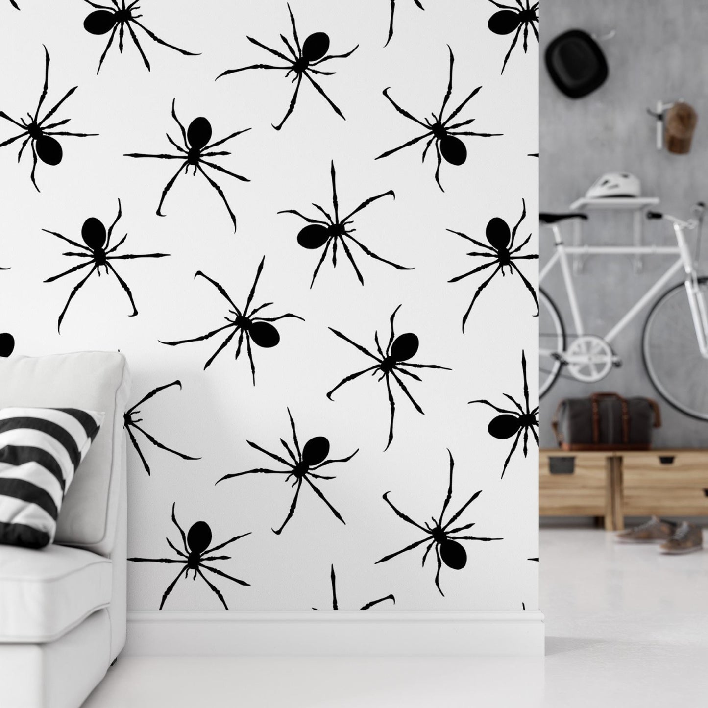 a wall with a repeating pattern of black spider silhouettes, creating a striking and bold visual effect.