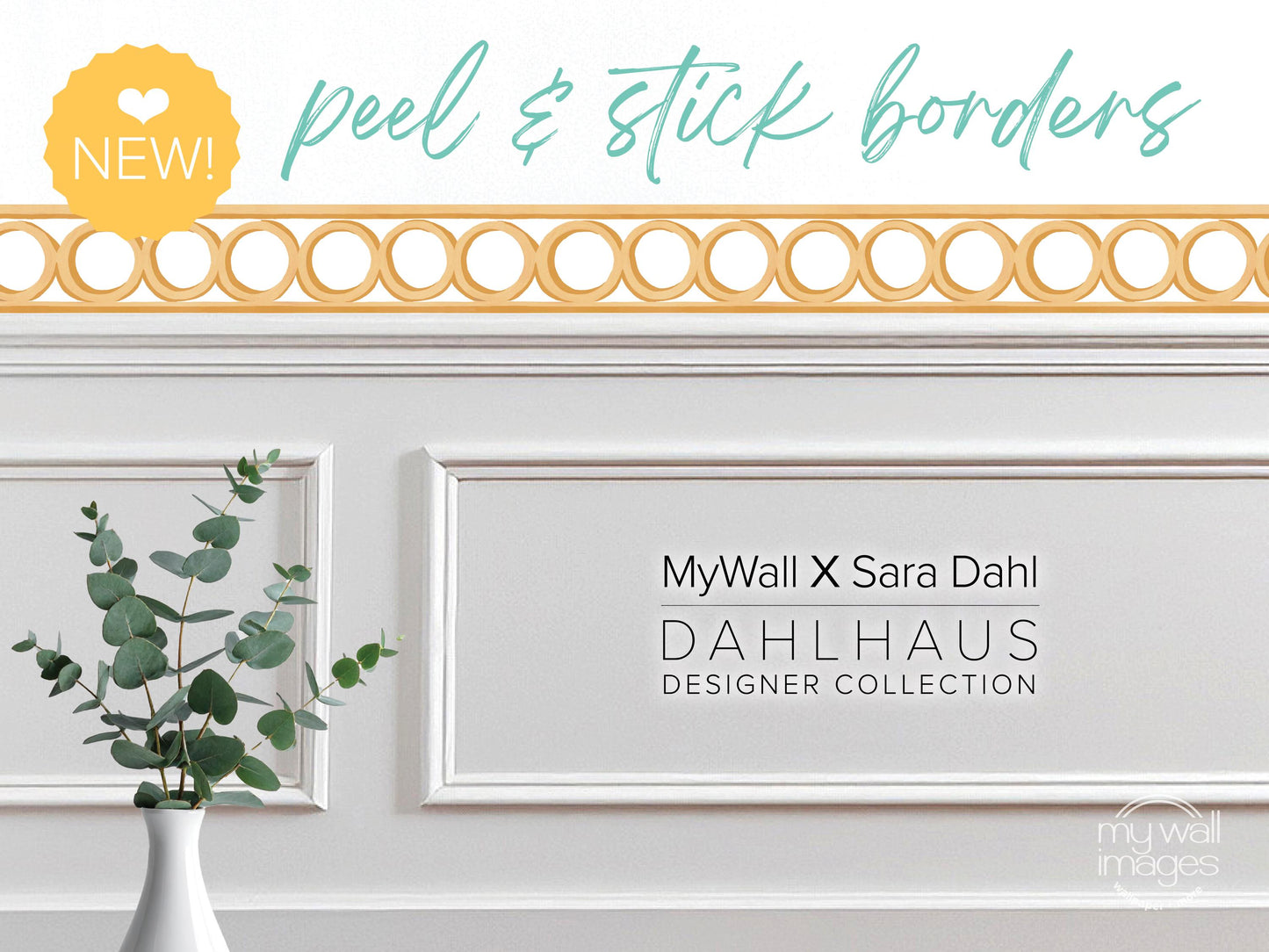 a white wall with a vase of green leaves, and there is text that reads "MyWall X Sara Dahl Dahlhaus Designer Collection".