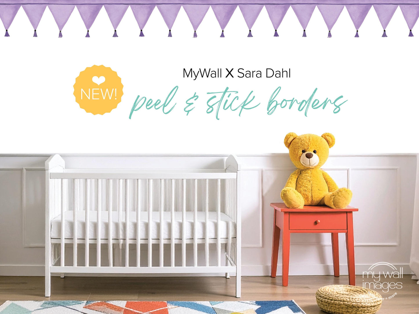 a nursery room with a white crib, a yellow teddy bear, and a red table. The crib is positioned against a white wall, and the teddy bear is sitting on the table. The room has a purple and white patterned rug on the floor, and there are purple and white banners hanging on the wall.