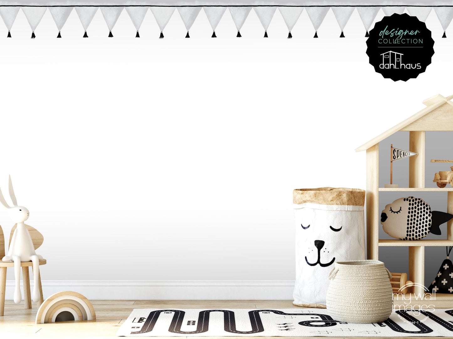 A minimalist and modern children's bedroom with a white color scheme, featuring a wooden shelf with toys, a stuffed animal, and a basket with a face design.