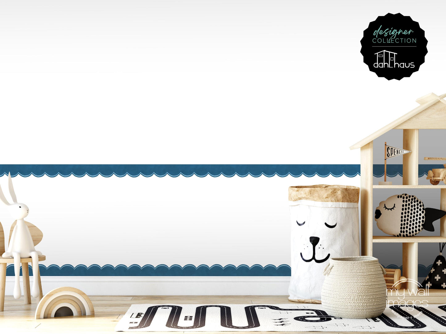 a child's room with a wooden shelf displaying various toys, a white basket with a face, and a small wooden house. The room has a blue and white color scheme, and the overall layout and arrangement of the objects create a cozy and playful atmosphere.
