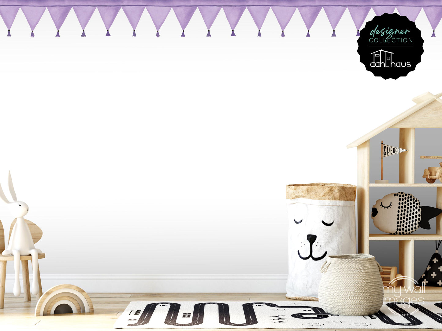 A child's bedroom with a wooden playhouse, a stuffed animal rabbit, and a basket with a face on it. The room has a white color scheme and a purple border.