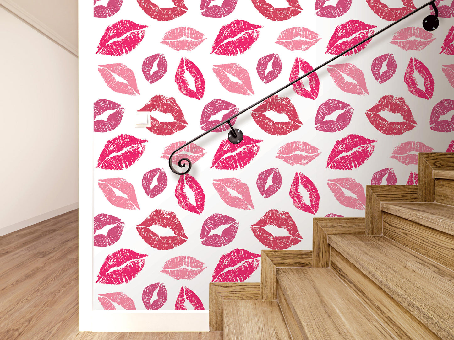 a wall with a repeating pattern of pink lips on a white background, creating a bold and eye-catching design.