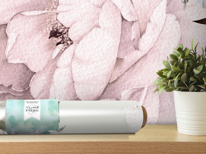 a wallpapered wall with a potted plant and a roll of wallpaper on a shelf.