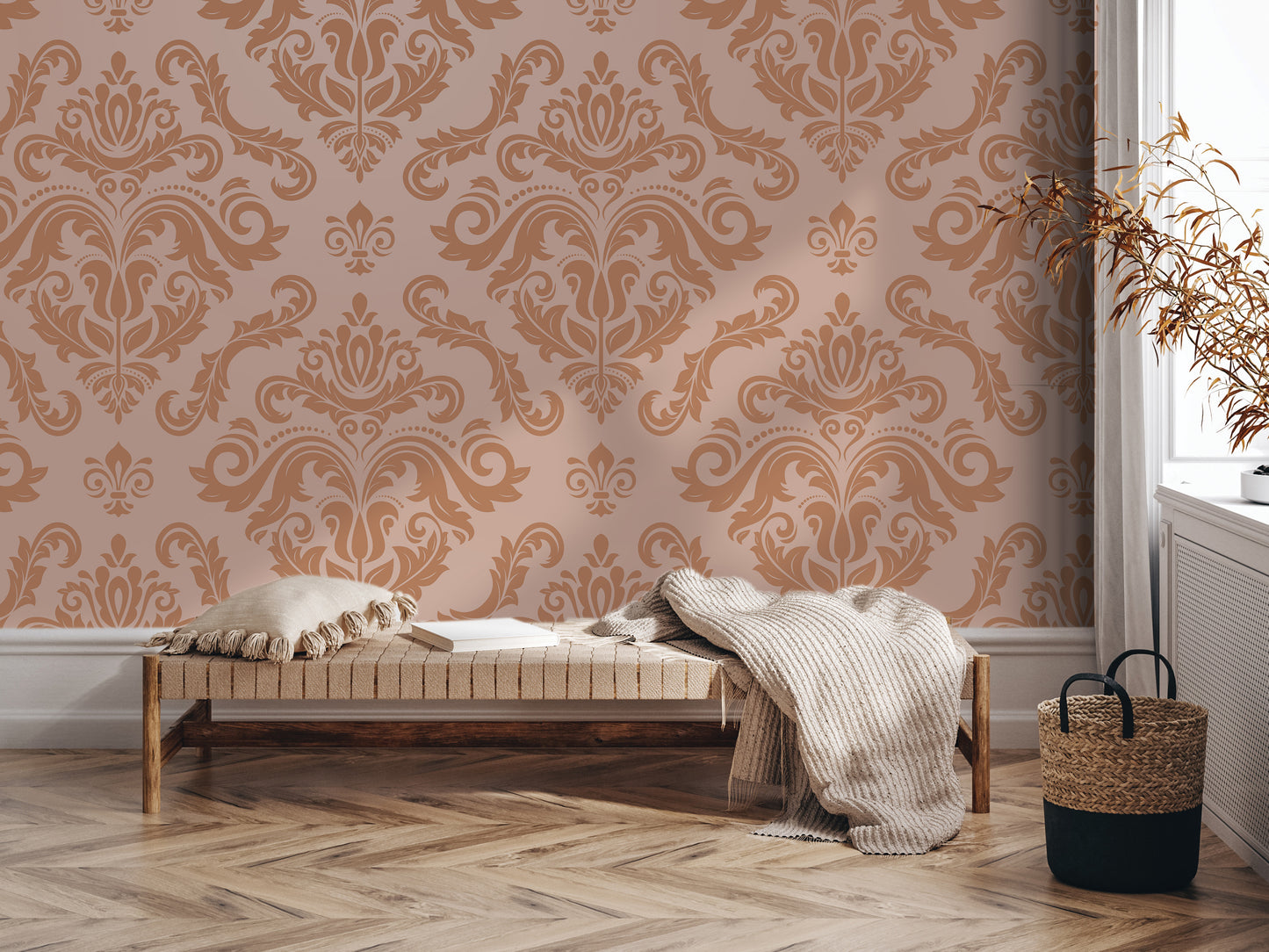 a cozy and inviting living space with a plush bench, a woven basket, and a decorative wallpapered wall.