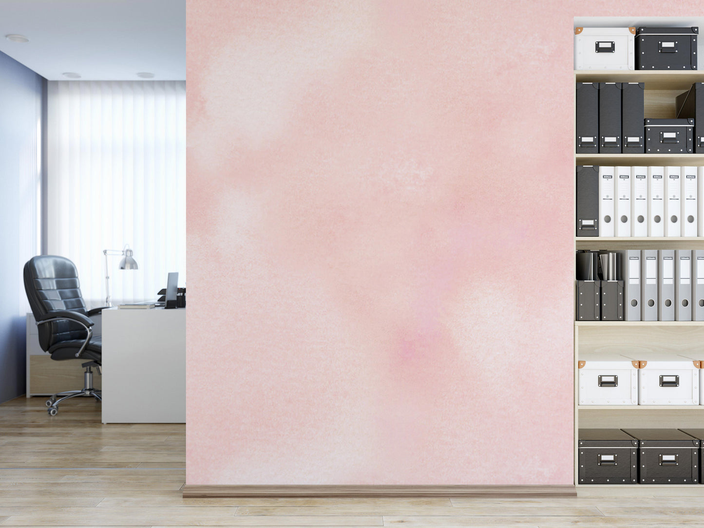a modern office space with a pink wall, a desk, and a bookshelf filled with various items.