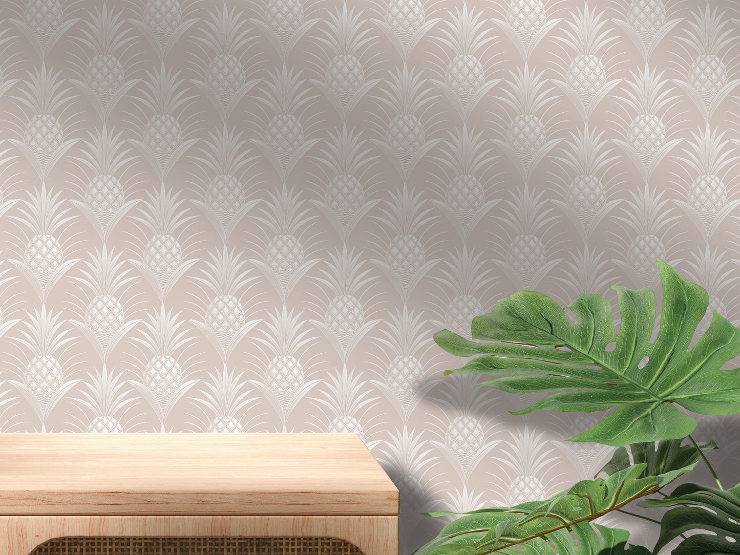 a wooden table with a plant on the right side, set against a wall with a repeating pattern of palm leaves.