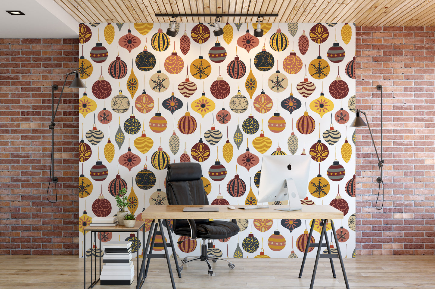 a modern office space with a large wall adorned with a vibrant pattern of colorful Christmas ornaments. In the center of the room, there is a wooden desk with a computer setup, including a monitor, keyboard, and mouse. A comfortable black office chair is positioned in front of the desk, and a potted plant is placed nearby. The overall design of the space creates a festive and creative atmosphere.