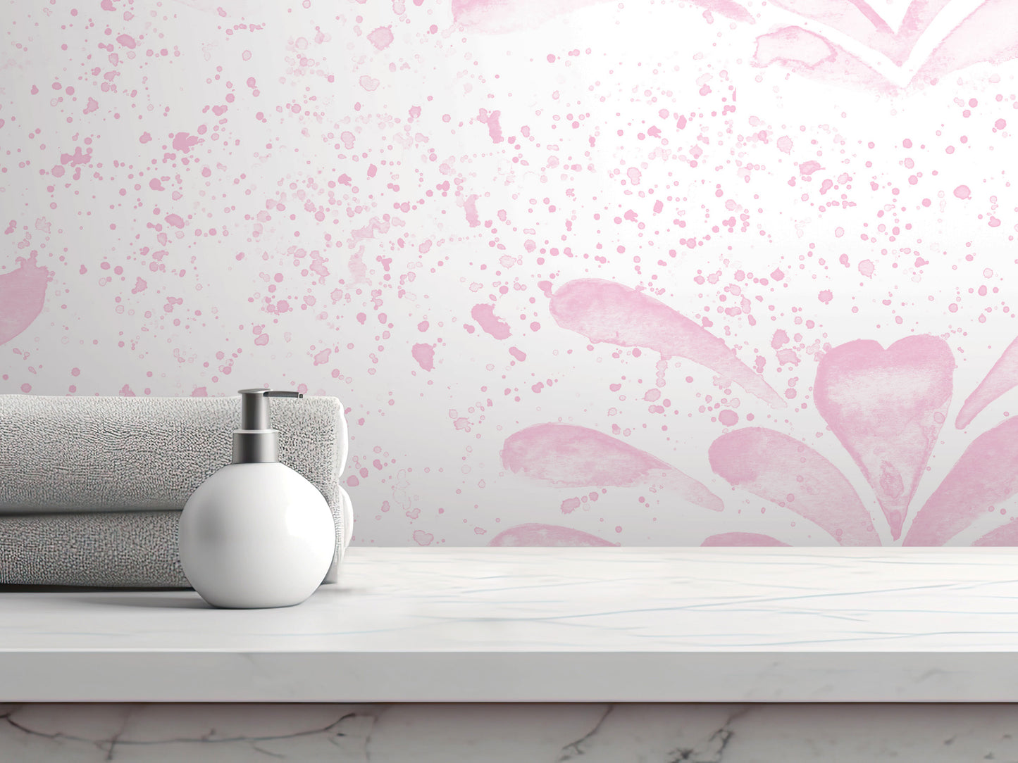 A white soap dispenser sits on a white marble countertop, with a folded gray towel and a pink floral patterned wall behind it.