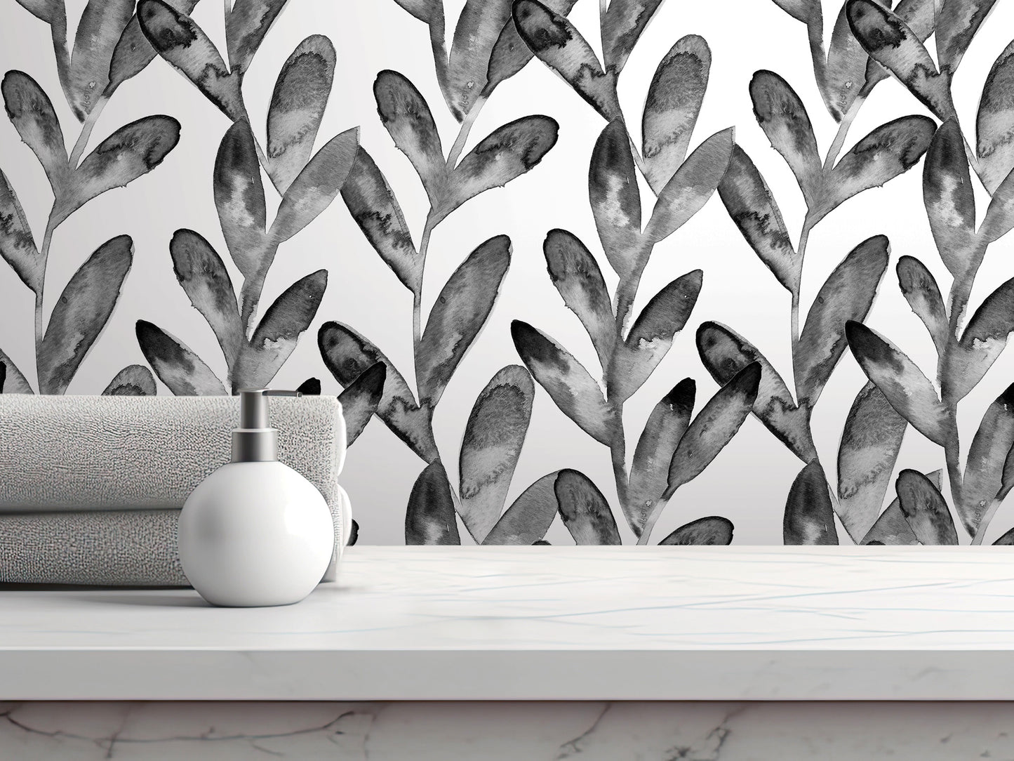 a white marble countertop with a white bottle and a gray towel. The background is a black and white wallpaper with a repeating leaf pattern.