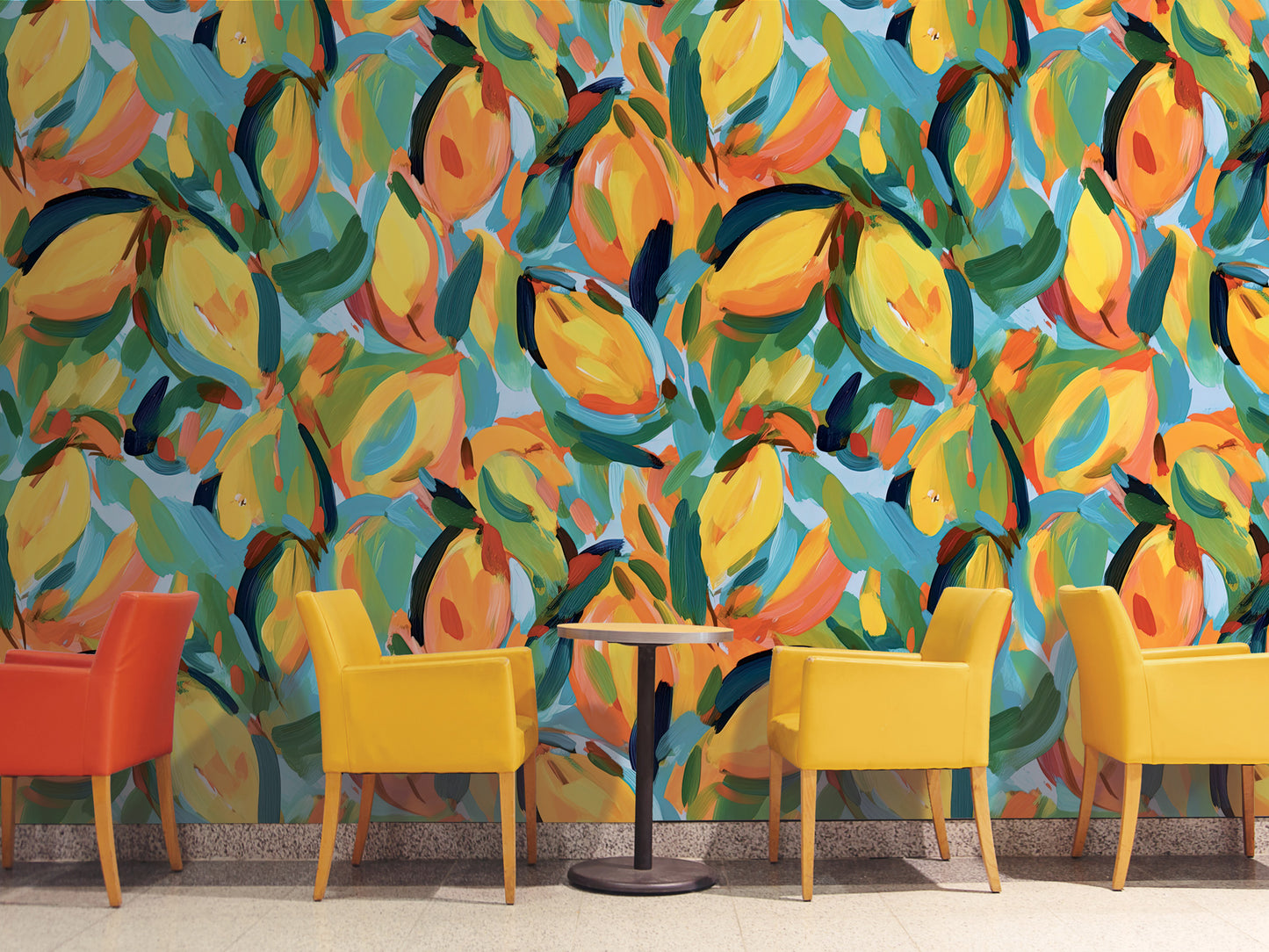 a vibrant and colorful mural with a repeating pattern of yellow and orange fruits, such as lemons and oranges, against a blue background. In front of the mural, there are four yellow chairs arranged in a row, creating a cozy seating area.