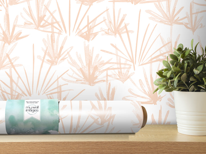 a wallpapered wall with a potted plant on a shelf next to it.