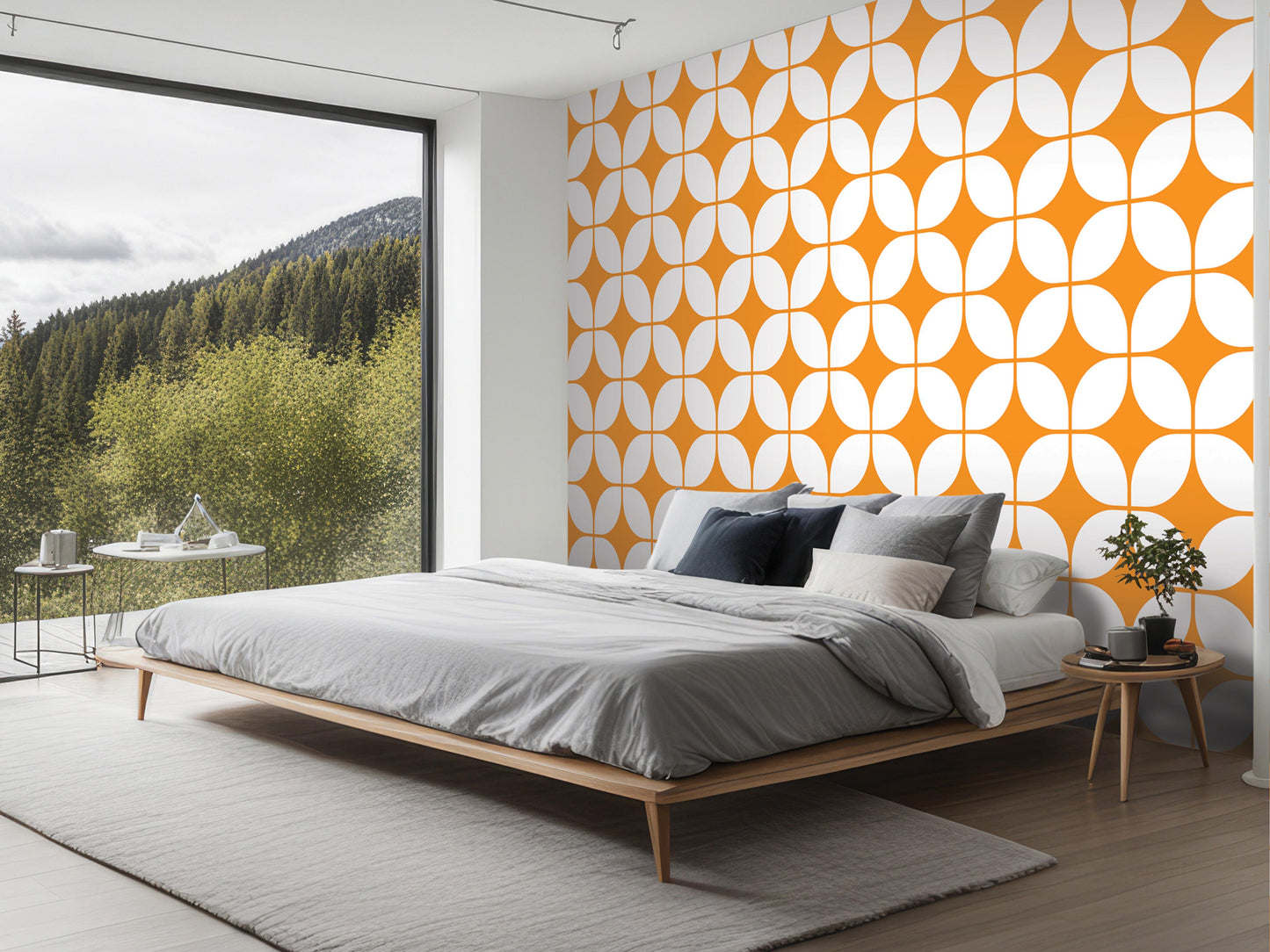 a modern bedroom with a large bed, a wooden nightstand, and a large window overlooking a forested area.