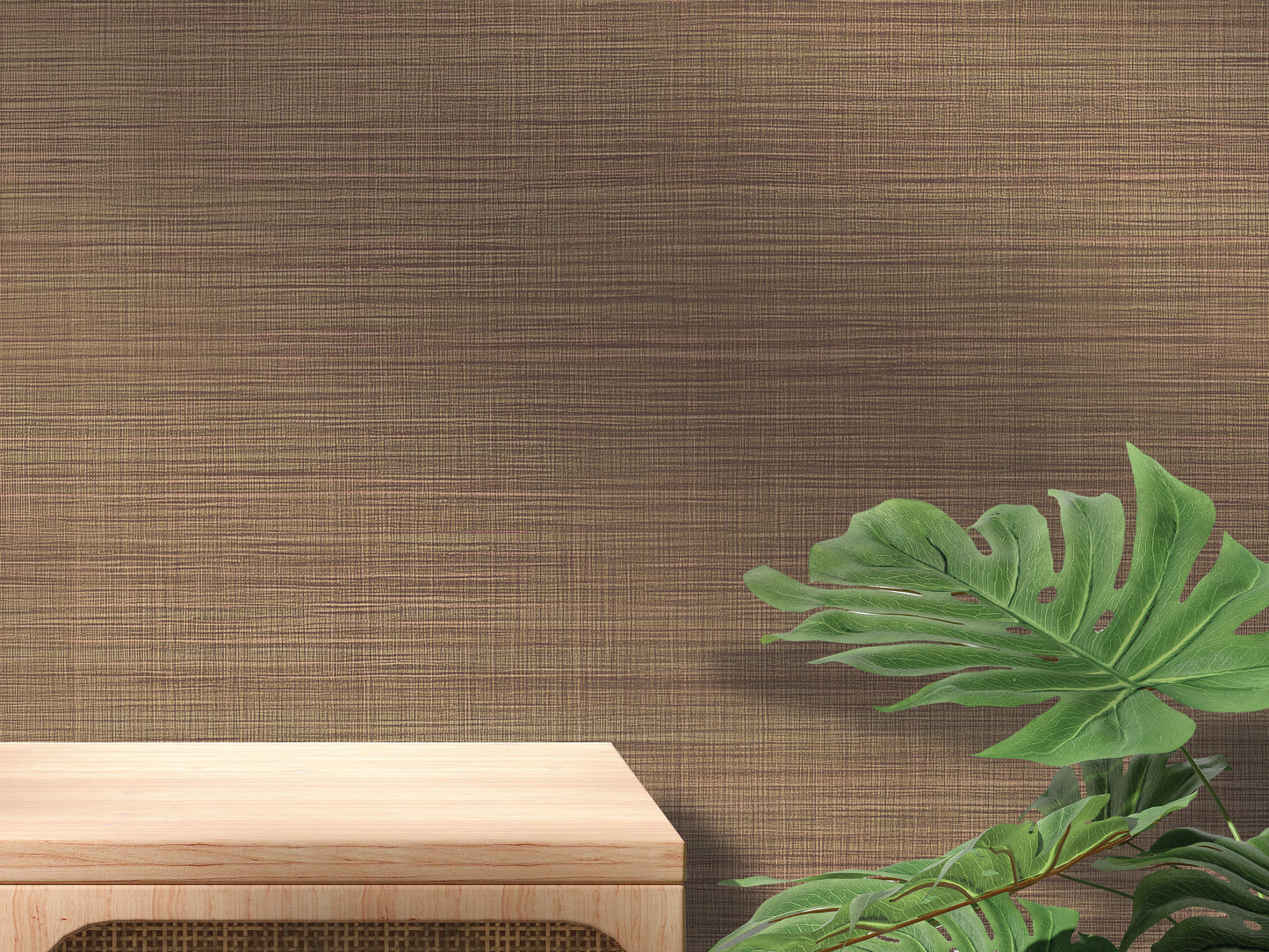 a wooden table with a plant on the right side, set against a textured brown wall.