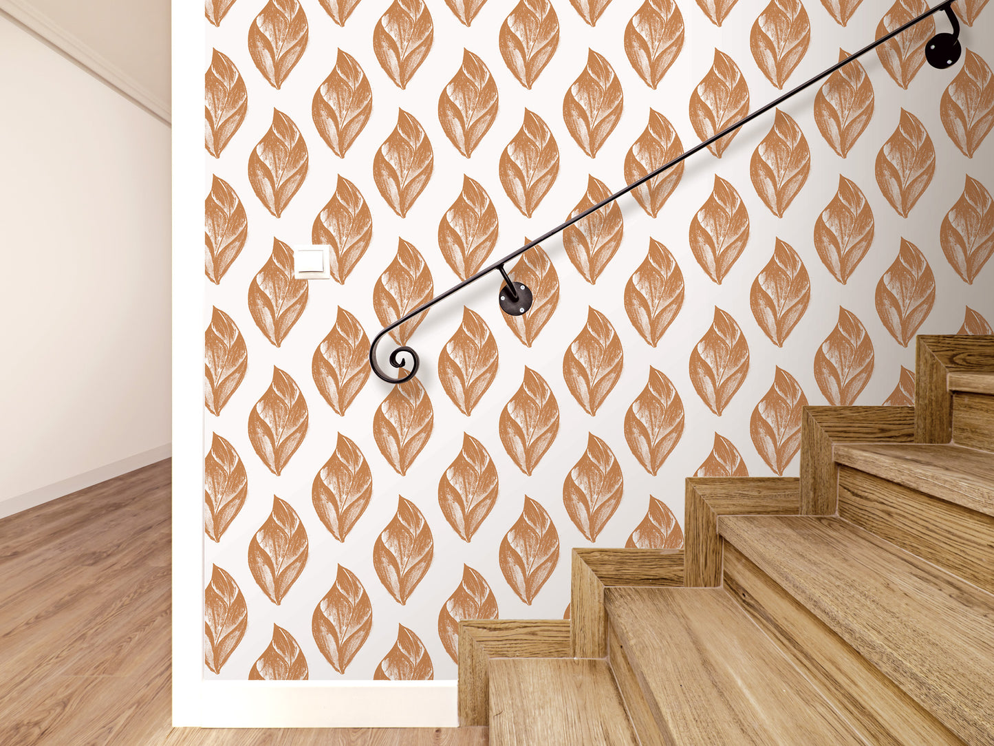 a staircase with a repeating pattern of brown leaf-like designs on the wall behind it.