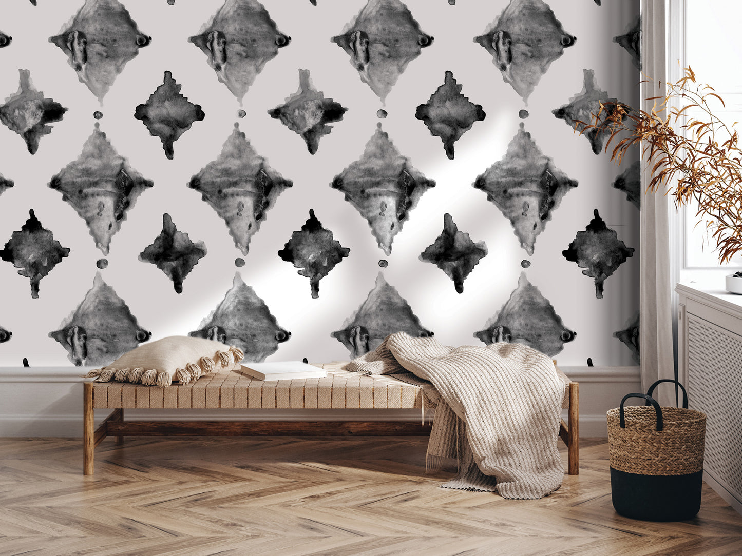 a modern and stylish interior design with a large black and white diamond pattern wallpaper covering the wall behind a wooden bench. The bench is positioned in front of the wall, and there is a woven basket placed next to it. The overall aesthetic of the room is contemporary and visually appealing.