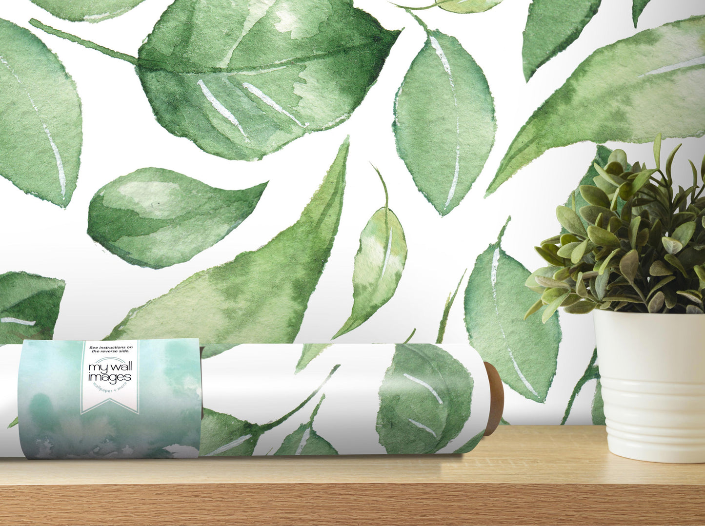 a wallpapered wall with a repeating pattern of green leaves, and there is a potted plant next to it on a shelf.