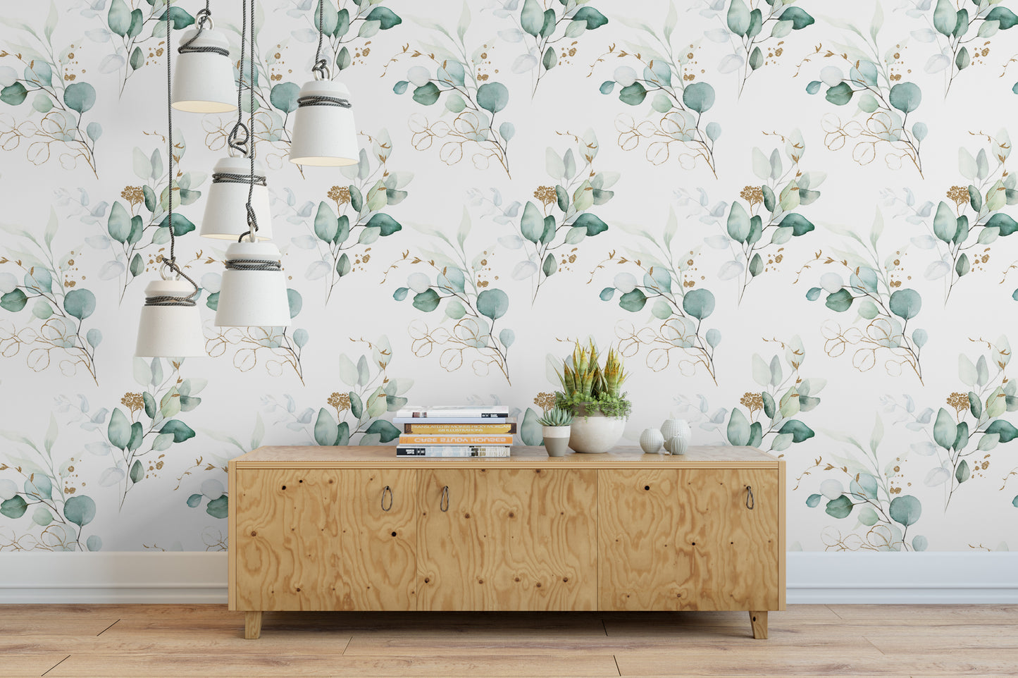 a wooden cabinet with a stack of books on top, set against a wall with a repeating floral pattern. The cabinet is positioned in front of a hanging light fixture, creating a cozy and inviting atmosphere.