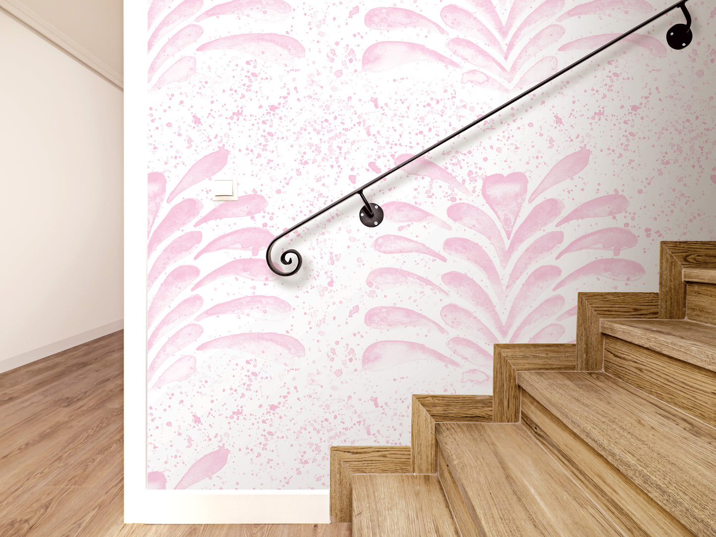 a wooden staircase with a black handrail, set against a pink and white patterned wall.