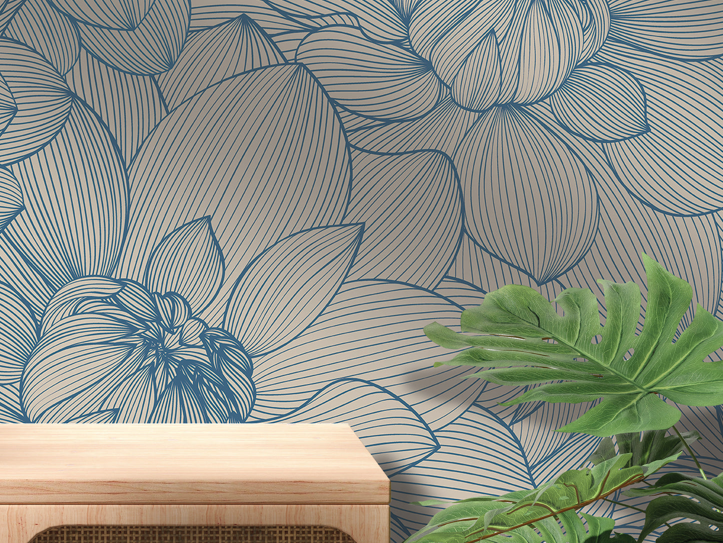 a wallpapered wall with a blue and white floral pattern, and a wooden table or shelf is placed in front of the wall.