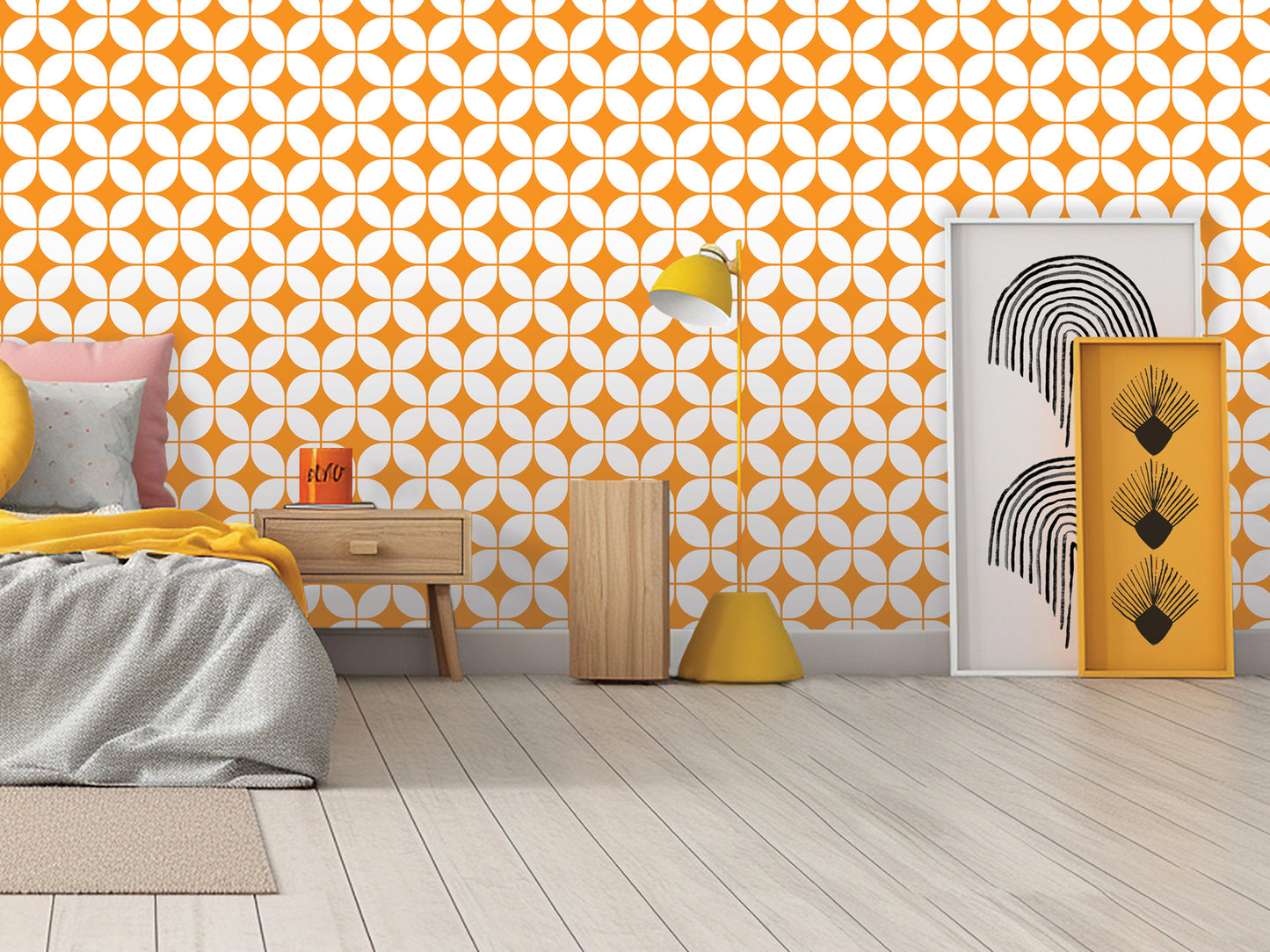 a modern bedroom with a geometric orange and white patterned wallpaper, a wooden bed frame, a wooden nightstand, a yellow lamp, and a framed artwork on the wall.