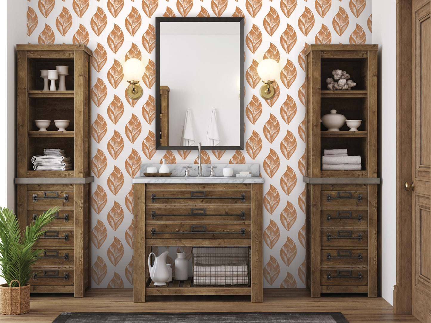 a bathroom with a wooden vanity, a mirror, and two wooden cabinets. The walls are decorated with a leaf-patterned wallpaper, and there are two potted plants in the room.
