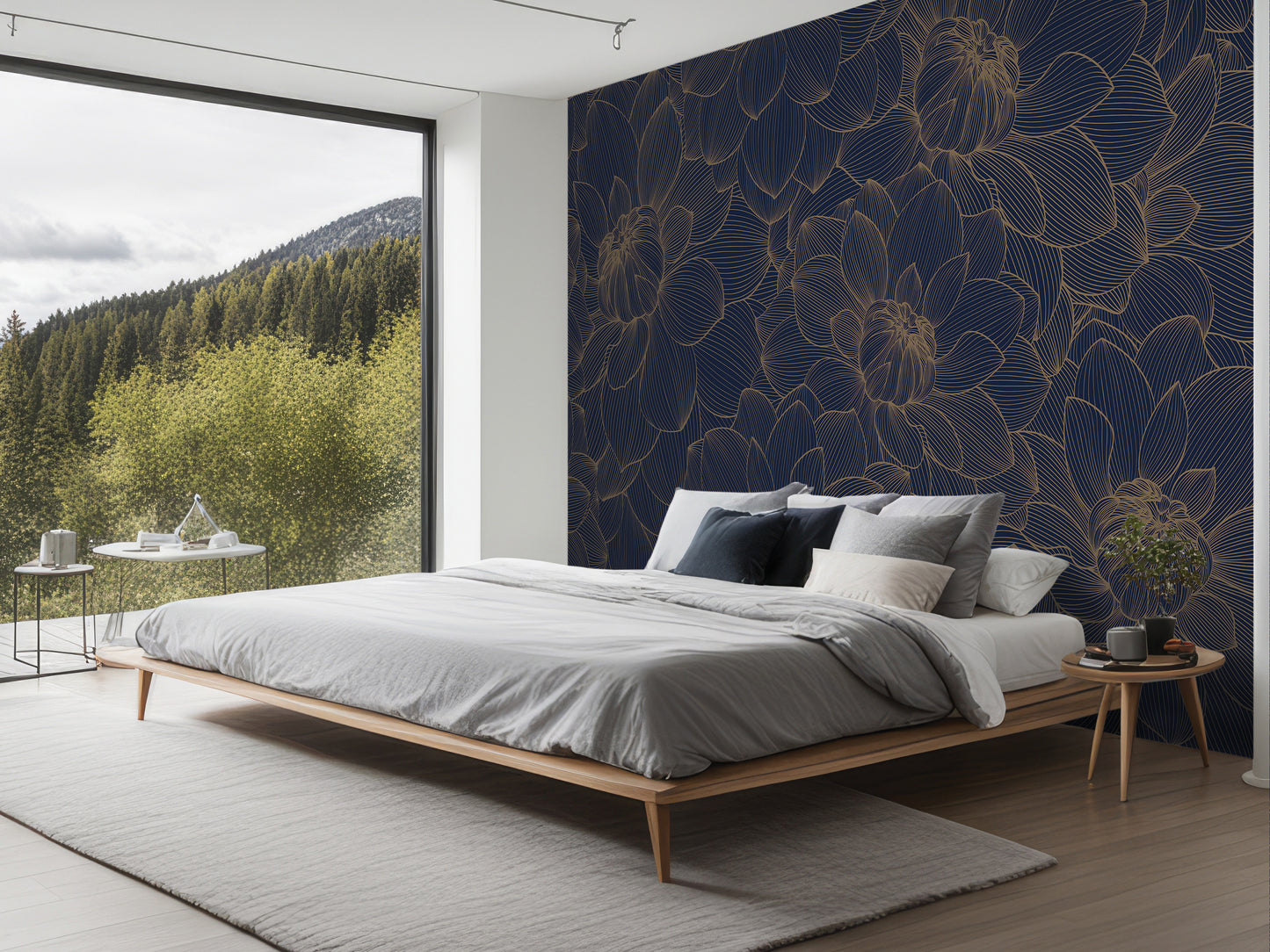 a modern bedroom with a large bed, a nightstand, and a large window overlooking a forested area.