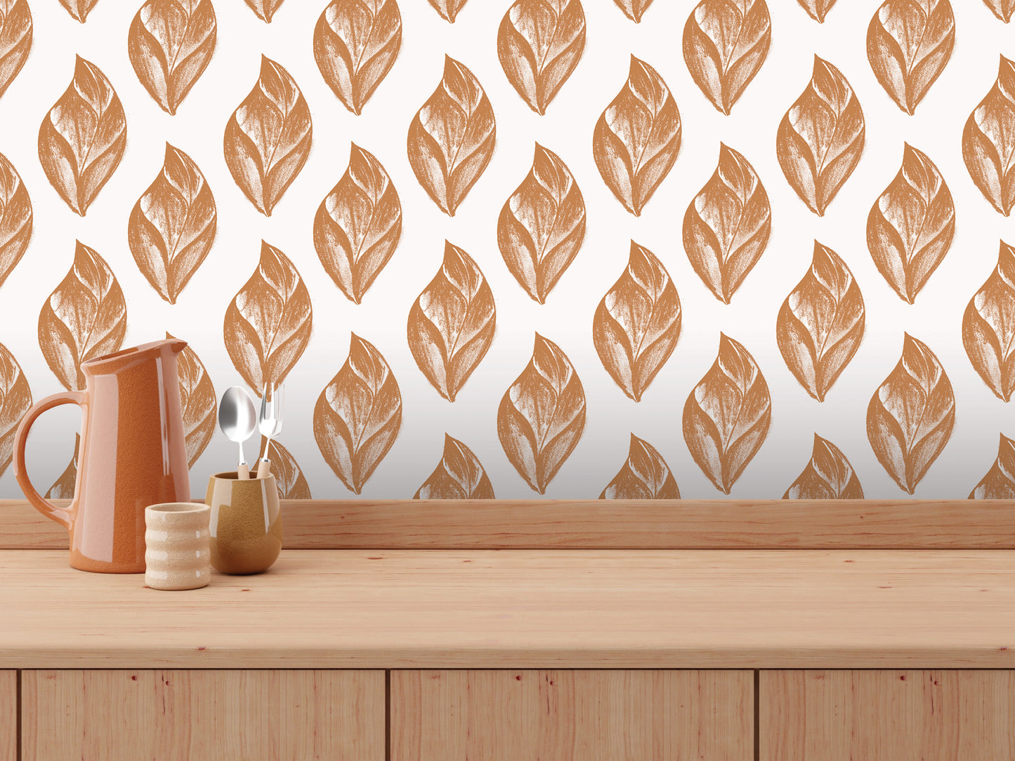 a wooden table with various objects on it, including a pitcher, a small cup, and a spoon. The background has a repeating pattern of orange leaves on a white background.