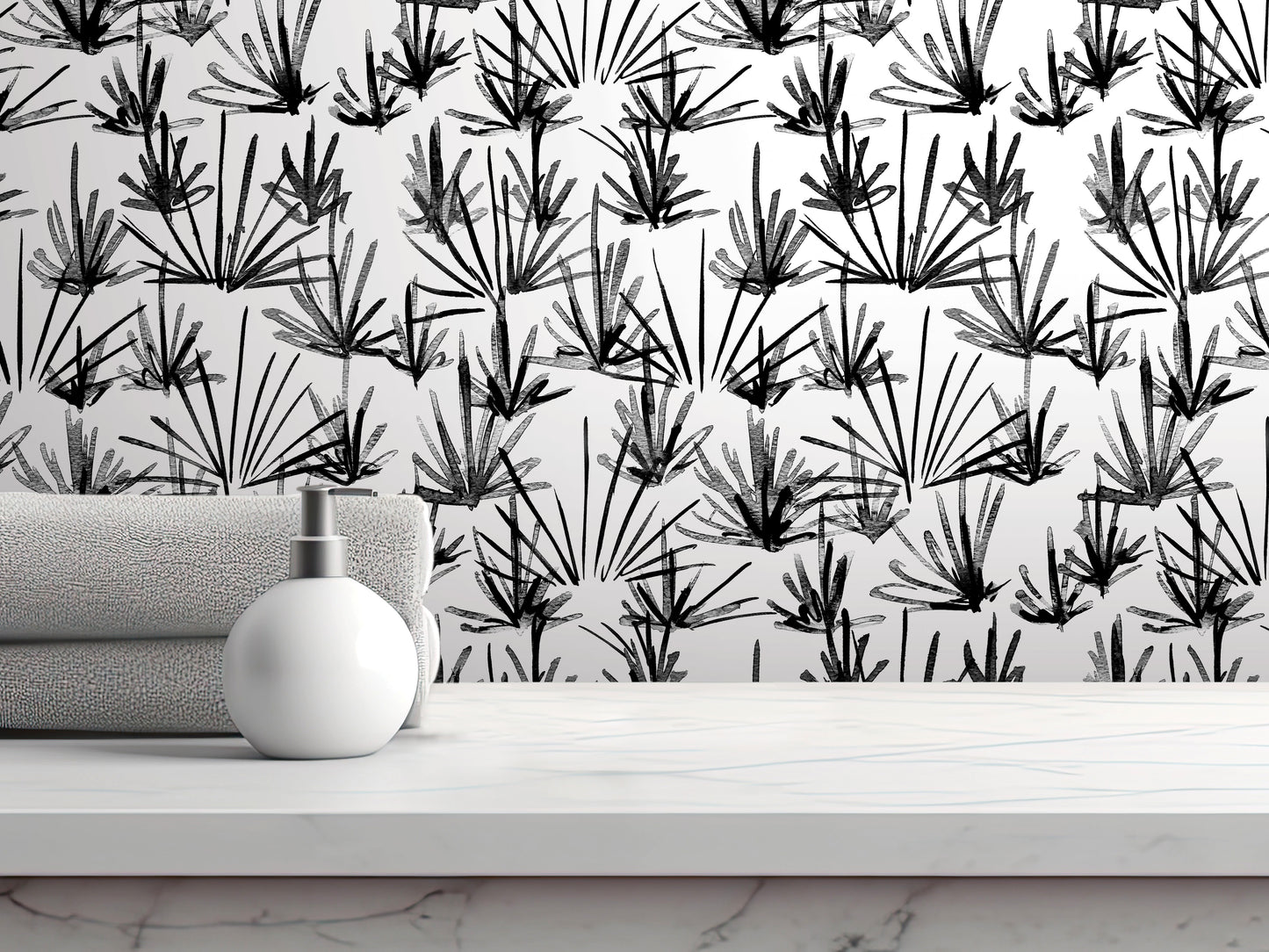 a white countertop with a white soap dispenser on it. Behind the countertop, there is a black and white patterned wallpaper with stylized plant-like designs.