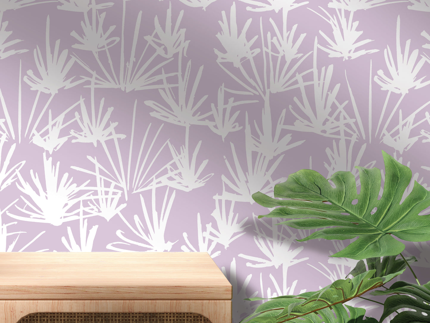 a wooden table with a plant on top of it, set against a wall with a repeating pattern of white and purple flowers or leaves.