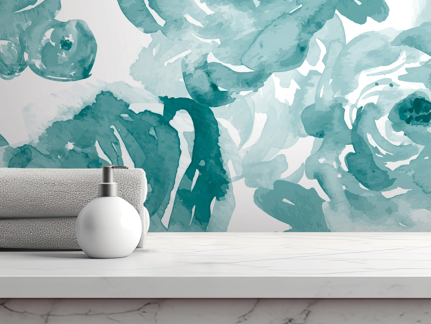 a white marble countertop with a white soap dispenser and a folded gray towel. The backdrop is a large abstract watercolor mural with shades of blue and green.