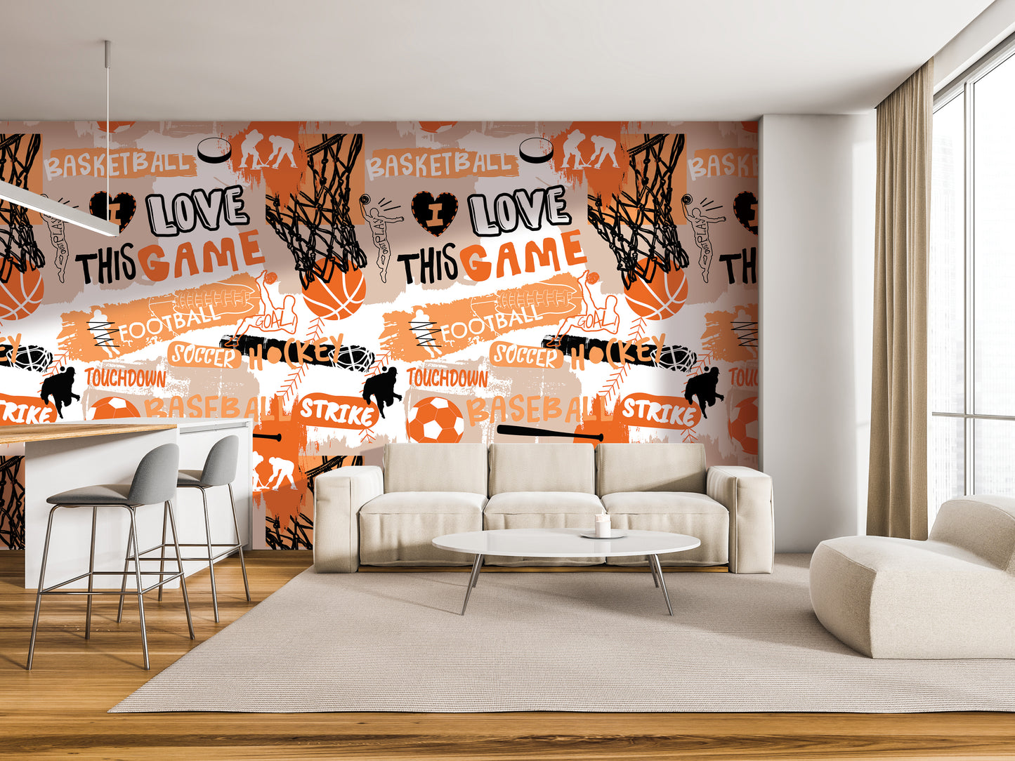a modern living room with a large wall mural that prominently displays the words "LOVE THIS GAME" in various sizes and colors. The mural also includes basketball and football imagery, as well as other sports-related elements. The room is furnished with a white sofa, a coffee table, and a barstool, creating a comfortable and stylish living space.