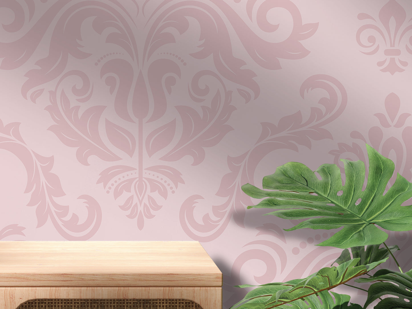 a wooden table with a plant on top of it, set against a pink wall with a floral pattern.