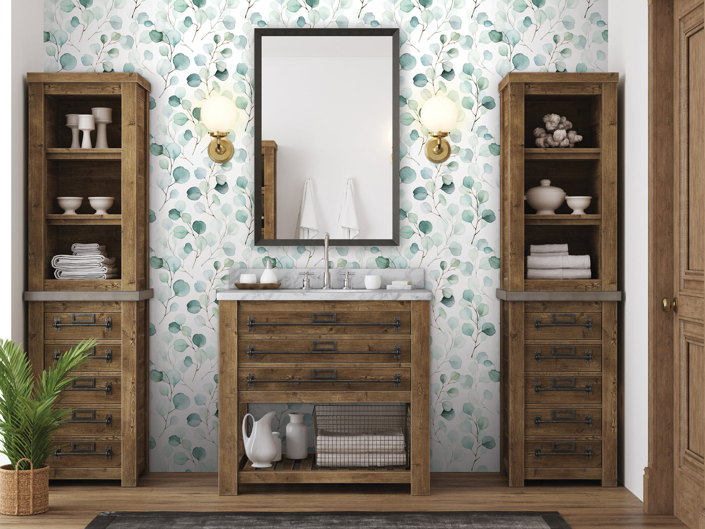 a bathroom with a wooden vanity, a mirror, and shelves. The walls are covered in a green and white leaf pattern wallpaper.