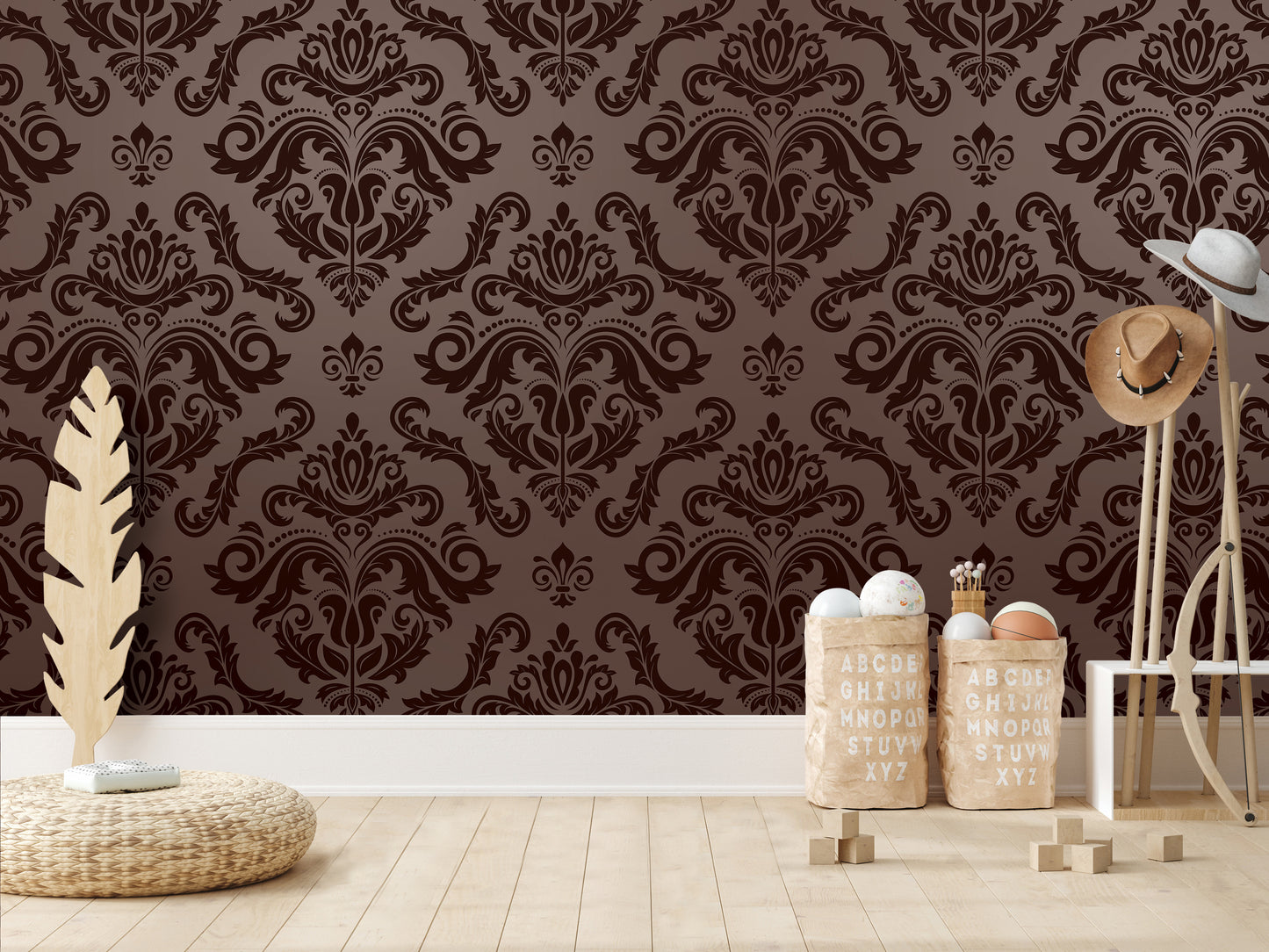 a room with a brown damask patterned wall, a wicker basket, a wooden hat rack, and a wooden stool.
