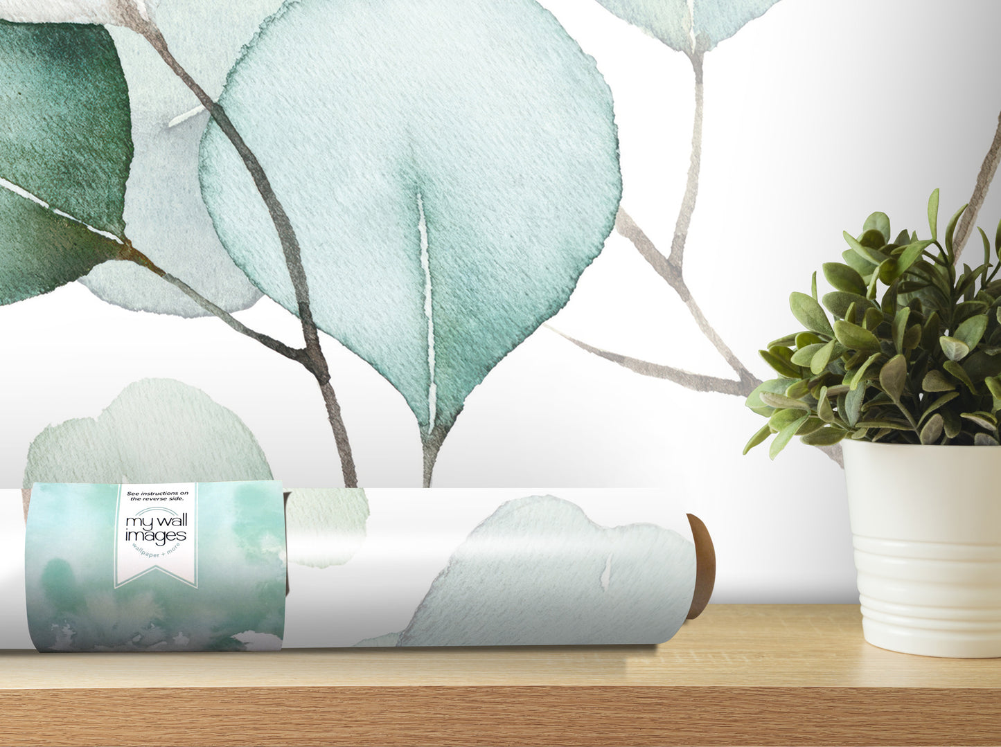 a wallpapered wall with a plant in a white pot on a wooden shelf, creating a serene and natural atmosphere.