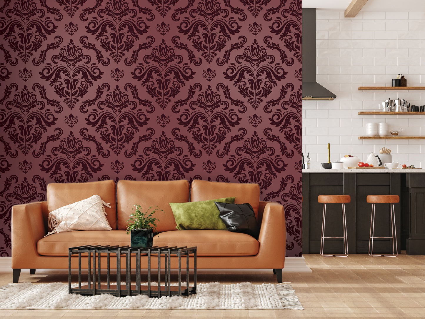 a living room with a brown leather sofa, a black coffee table, and a rug on the floor. The walls are decorated with a burgundy damask pattern, and there is a kitchen area with a countertop and stools.