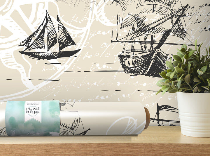 a wall with a large, intricate black and white drawing of a sailboat, along with some additional sketches and doodles. In the foreground, there is a roll of wallpaper with a watercolor-like design, and a potted plant is placed on a shelf next to it.
