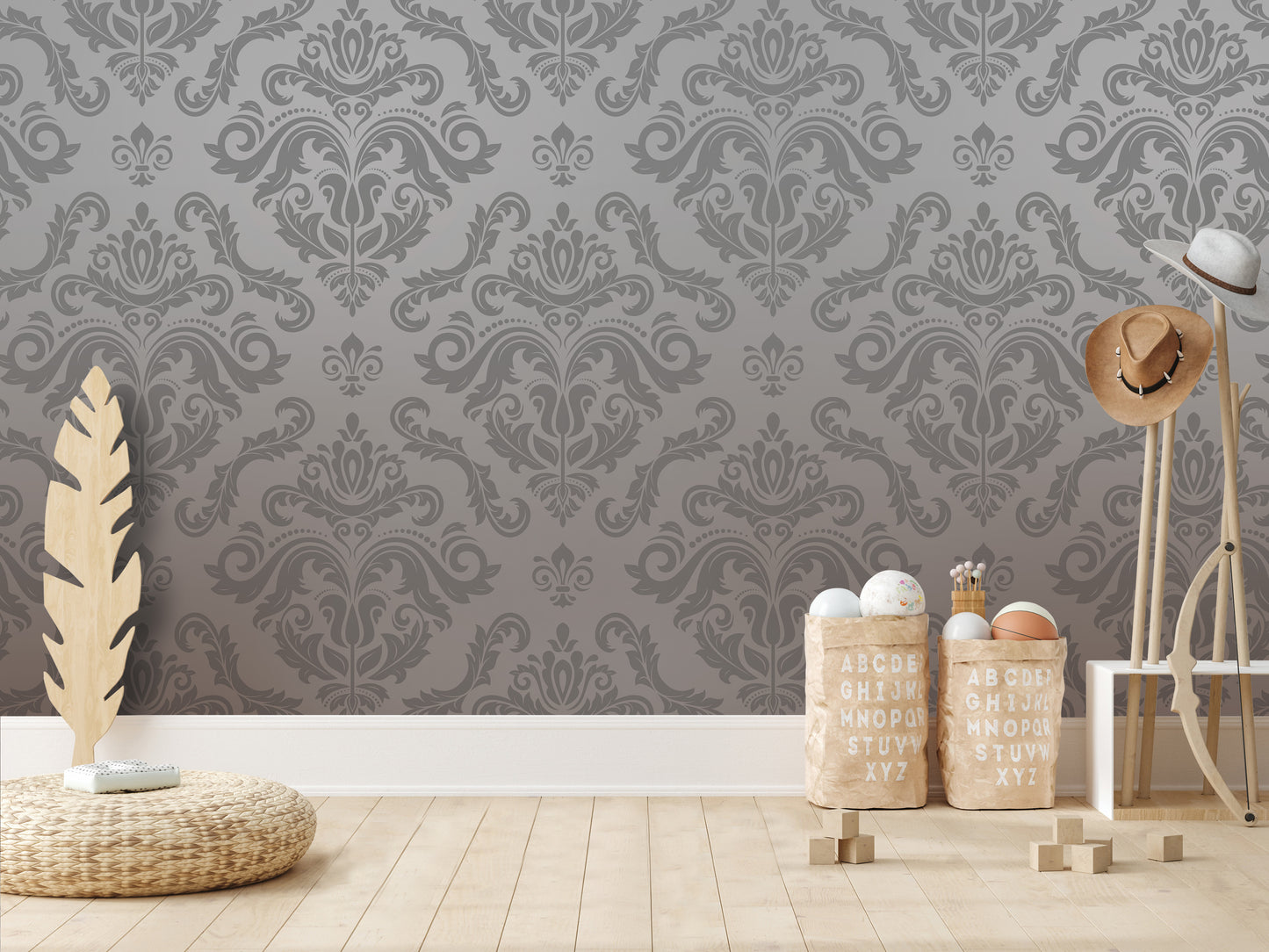 a room with a gray wall pattern, a wooden floor, and various objects such as a feather, a hat, and a basket.